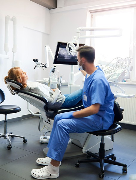 A dental team treating a patient